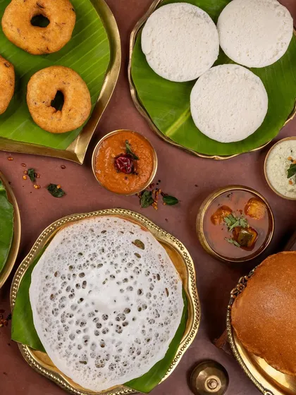 I believe in capturing the soul of a cuisine. This South Indian spread was styled to feel like a grand, authentic feast, with banana leaves and brassware that highlight the vibrant colours and textures of each dish.