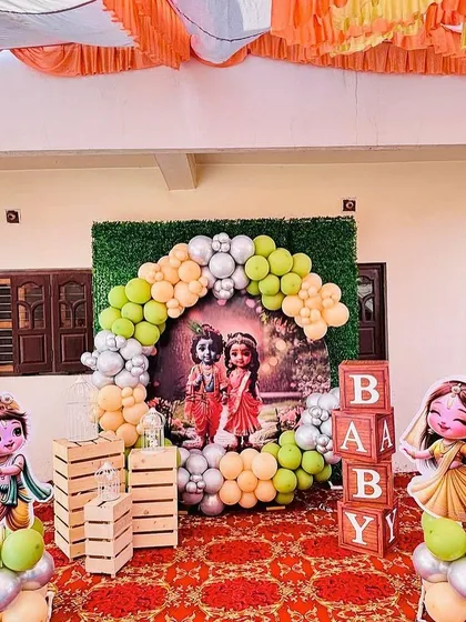 Here is a Little Krishna theme I created for a baby's celebration. I use custom character cutouts, a balloon arch in themed colors, and a beautiful backdrop to bring the divine story to life for your little one's event.