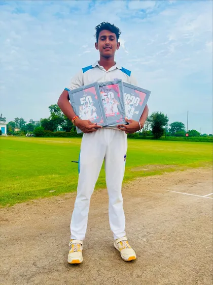 A full-length shot of Chandan with his milestone awards. An incredible all-round achievement.