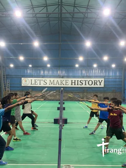 Discipline, focus, and teamwork are at the heart of our training. This powerful image of our young athletes in a synchronized lunge drill perfectly captures the spirit and dedication we instill, right under our motto: "Let's Make History."