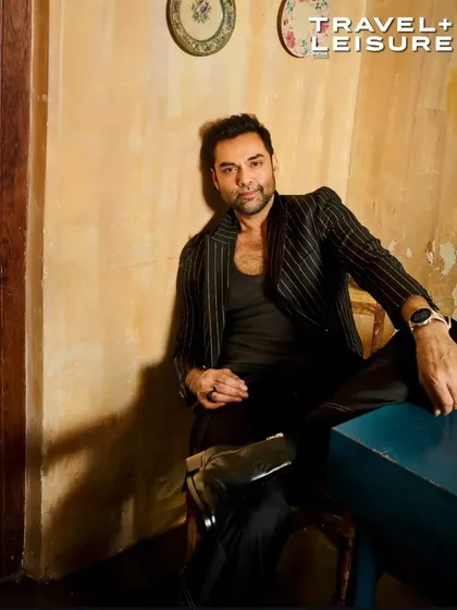 A selection of looks from my cover shoot with Abhay Deol for Travel + Leisure. The styling ranged from casual athleisure by Onitsuka Tiger to sharp pinstripe blazers, showcasing a versatile wardrobe for the modern traveler.