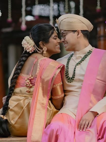 A close-up of the couple on the swing, their smiles reflecting the joy of their wedding day.