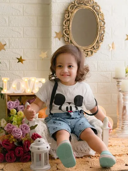 A little boy with a big personality. This fun and casual toddler shoot captures his playful spirit and love for Mickey Mouse.