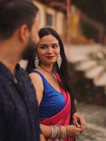 A beautiful close-up of the bride, her expression serene and happy, during their spiritual pre-wedding shoot in Rishikesh.