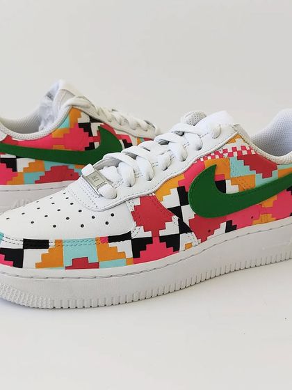 Another angle of the Dhurrie weave sneakers. The solid green swoosh provides a great contrast to the intricate geometric pattern covering the shoe.