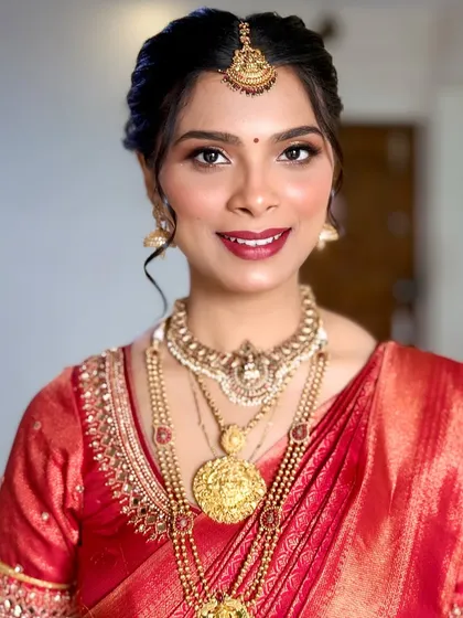 A beautiful smiling portrait. The makeup enhances her features naturally, giving her a confident and happy glow.