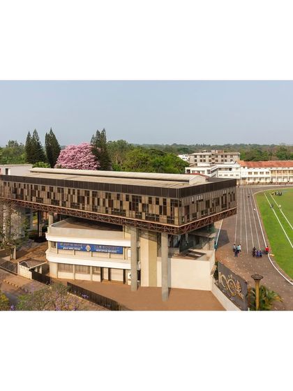 An aerial view shows "Hoverspace" in its entirety, acting as a backdrop to the sports ground and a new landmark for the campus.