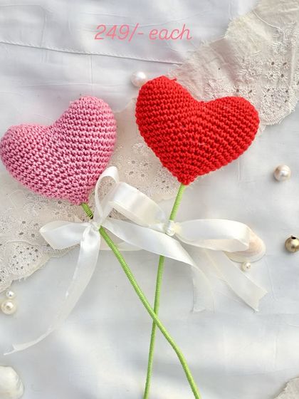 Two of our best-selling crochet heart stems, one in pink and one in red. At just ₹249 each, they are a sweet and affordable gift.