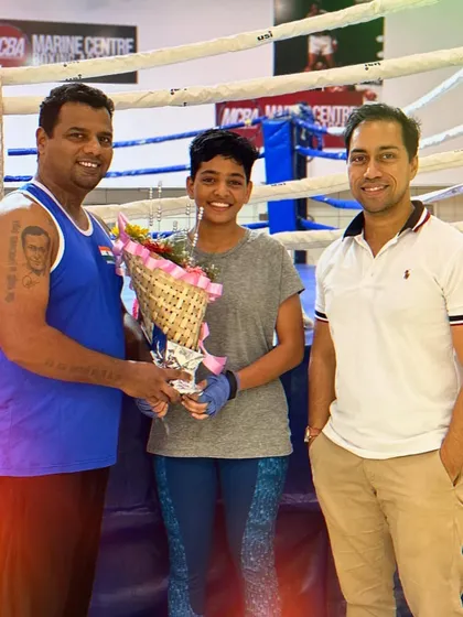 Riddhi Pawase being congratulated by her coaches for her performance at the National selections.