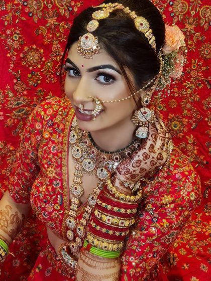 A smiling 'Sohni Bride'. She looks so happy and radiant, ready for her big day.