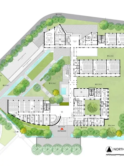This detailed floor plan for Symbiosis International University shows the arrangement of academic buildings around green courtyards and pathways. The layout is designed to encourage movement, interaction, and engagement with the outdoors.