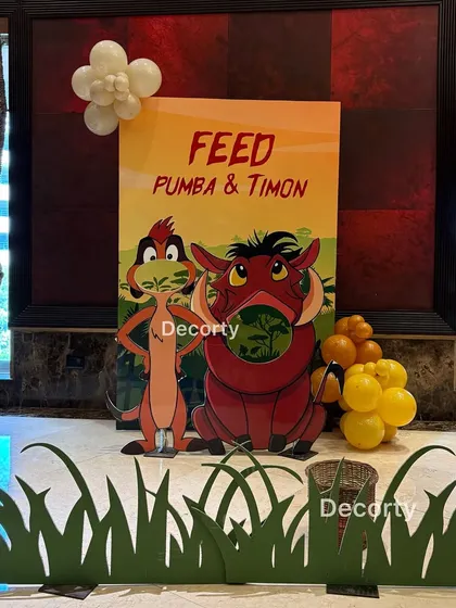 A duplicate shot of the "Feed Pumbaa & Timon" game, a popular choice for interactive kids' party entertainment.