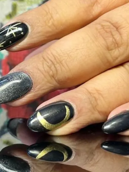 A close-up of the intricate gold moon and star designs.