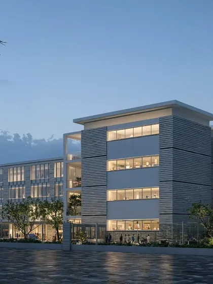 A render showing an alternative material palette and massing for the same North Karnataka institute. This exploration uses horizontal bands and a more solid, stone-like texture to give the building a grounded and monumental feel, showcasing our versatility in refining a design concept.
