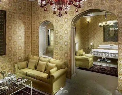 For the Nivah heritage property in Moradabad, I designed this wallpaper inspired by intricate Mughal jaali patterns. The golden motifs on the walls create a sense of quiet luxury, perfectly complementing the arched doorways and classic furniture of this historic space.