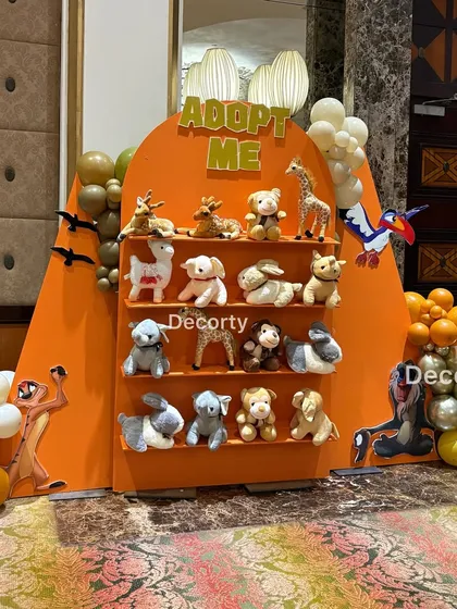 The "Adopt Me" return gift station, fully stocked with a variety of plush jungle animals for the kids to choose from.