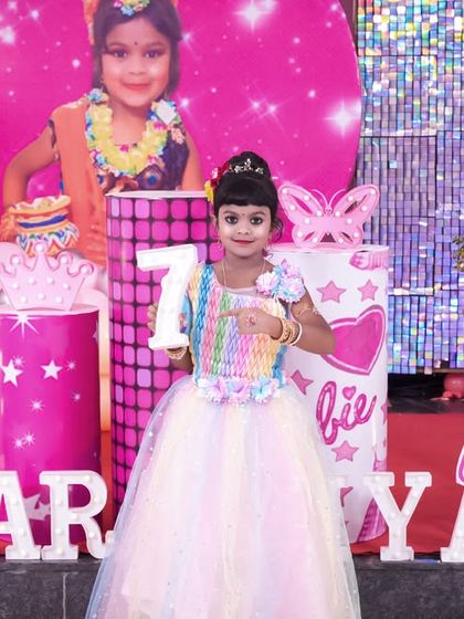 A playful 'Masha and the Bear' themed birthday party, with forest decor, character cutouts, and colorful balloons, perfect for a fun-filled adventure.