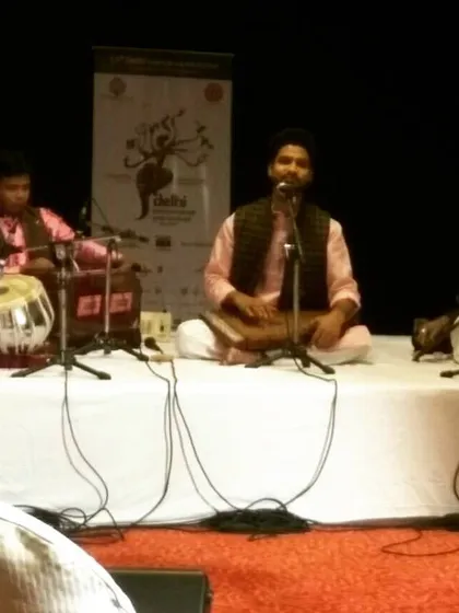 A view from the audience at the Delhi International Arts Festival concert. It captures the atmosphere of the live performance as we present traditional Indian classical music.