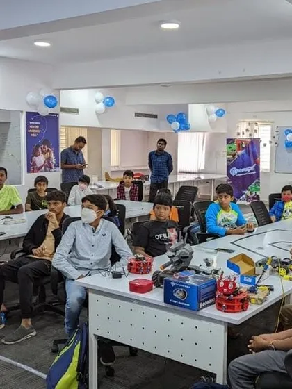 Students and instructors gather for a community meetup, a great opportunity for everyone to share their latest projects and learn from each other.