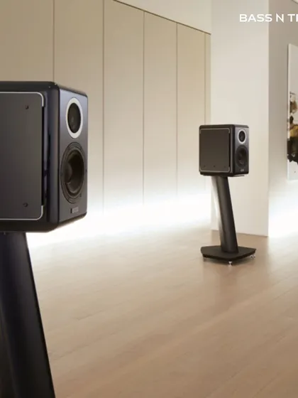 A pair of TAD ME1 speakers in a listening room. The beryllium tweeter and aramid composite cone woofer work together to create a natural, stable, and immersive sound field.