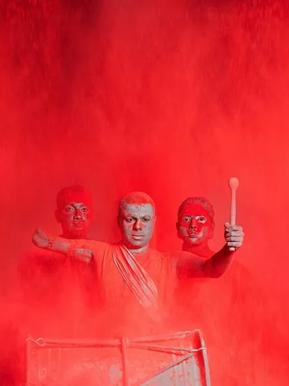 For this ABP Studios campaign, the concept was to use color as a raw, overwhelming force. The simple, toga-like drapes on the performers ensure the focus remains on the dramatic explosion of red powder, creating a powerful and symbolic visual.