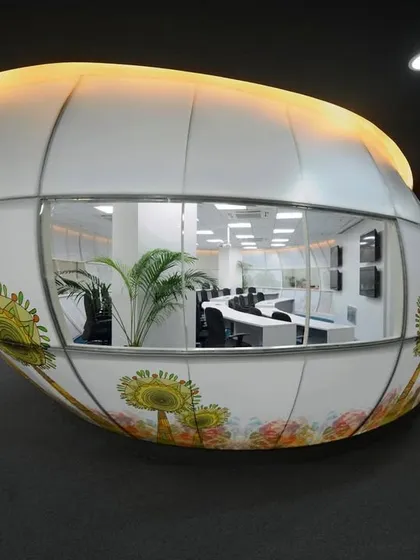 The "Egg". This pod meeting room was one of our first uses of stretch fabric to create a sculptural skin. It sits within the open office as a functional art piece.