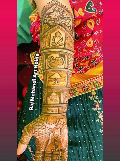 Another view of the bridal forearm panel design. This side features a doli (palanquin) and the names of the bride and groom, Pankaj and Neha, written in Hindi.