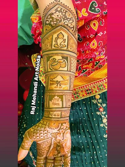 Another view of the bridal forearm panel design. This side features a doli (palanquin) and the names of the bride and groom, Pankaj and Neha, written in Hindi.