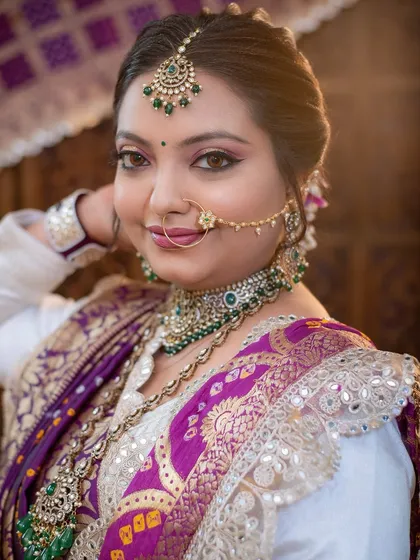 A confident and beautiful bride, ready for her big day in full Gujarati splendor.