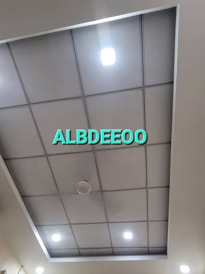 A clean and professional grid false ceiling we installed in an office. This type of ceiling is great for commercial spaces as it allows easy access to wiring and ventilation systems.