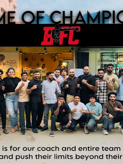 This is our team, our family, celebrating a victory outside our gym, the Home of Champions. When one of us wins, we all win. We train together, we win together, and we get ready for the next challenge together.