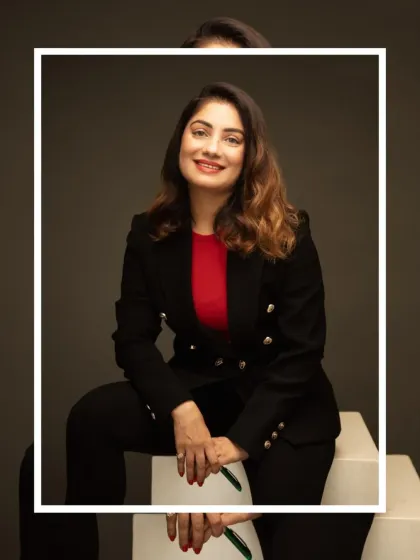 We explore different poses during a session to give you a variety of options. This seated business portrait creates a professional yet approachable look, ideal for personal branding and speaker profiles.