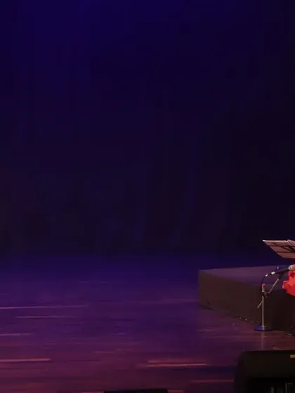 A full-stage view of 'Mandala', showing the simple, clean aesthetic. We chose to keep the production minimal to allow the poetry, music, and dance to be the primary focus.