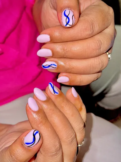 A different view of the abstract liner art, showing the detail and precision of the hand-painted lines.