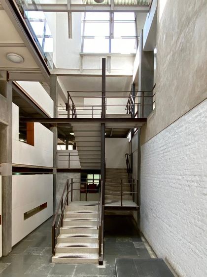 An overview of the multi-level interior of Zanav Home, a space designed for creative work and collaboration.