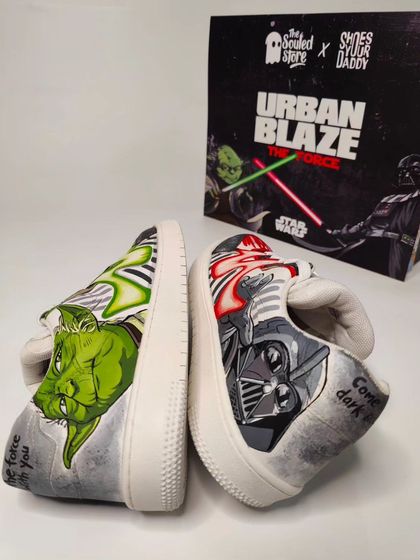 The complete mismatched pair, showing both the Yoda and Darth Vader designs side-by-side. The concept was to create a unique story on each foot, coming together as one epic narrative.
