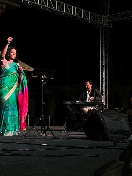 Performing at Hampi Utsav, with the magnificent stone pillars of the Virupaksha Temple complex as our backdrop. The ambiance is simply unparalleled.