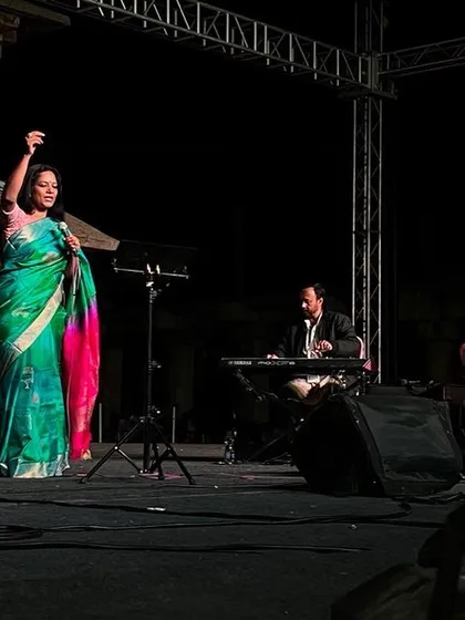 Performing at Hampi Utsav, with the magnificent stone pillars of the Virupaksha Temple complex as our backdrop. The ambiance is simply unparalleled.