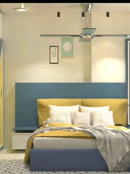 The bed features a blue headboard and yellow bedding, continuing the room's cheerful color theme.