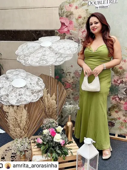 This elegant photo booth was designed for a jewelry brand's launch event. I used a soft floral backdrop, delicate lace flower cutouts, and rustic elements like wooden crates and lanterns to create a sophisticated and memorable spot for guests to take pictures.