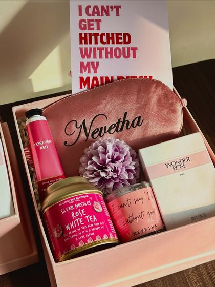 I love a fun and cheeky proposal card! This box was designed to make a bestie smile, filled with a personalized pouch, rose-scented tea, a custom candle, and skincare goodies.