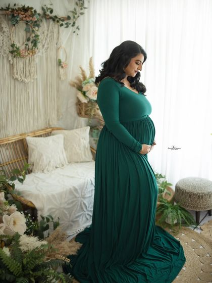 Another beautiful shot from the green gown series, showing a different angle of our versatile boho setup. The natural elements create a calming atmosphere.