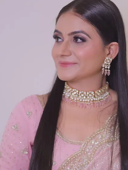A solo portrait of the engagement bride, looking elegant and serene.