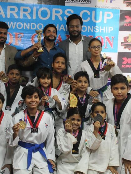 A group of our proud medalists from the Warriors Cup. Their smiles show the happiness that comes from seeing their hard work pay off.