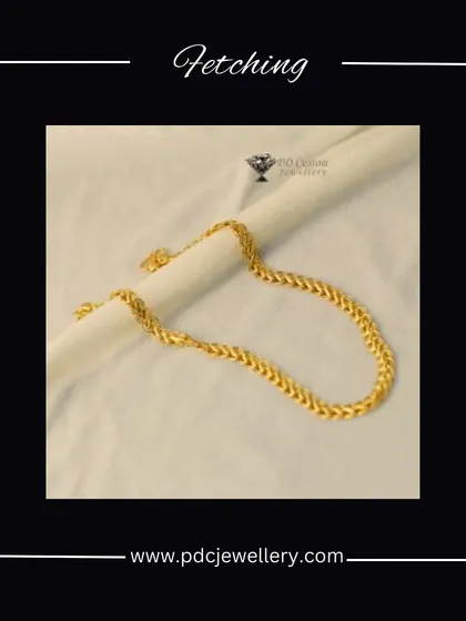 A fetching 22kt hallmark gold chain with a classic wheat link design. This type of chain is known for its durability and timeless appeal, making it a perfect foundation for any man's jewellery collection.