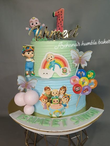 A closer look at Ishmeet's two-tier Cocomelon birthday cake.