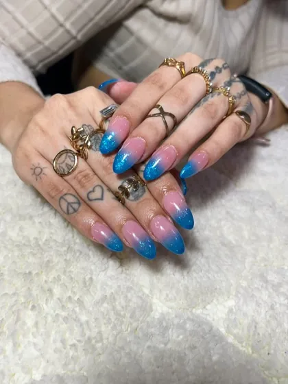 Another view of this fun pink and blue glitter ombre, showing off the sparkling texture and vibrant colors.