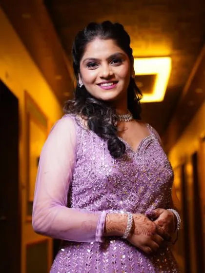 A happy and radiant engagement bride. Her glam eyeshadow and glowing skin were the highlights of this beautiful makeup look.