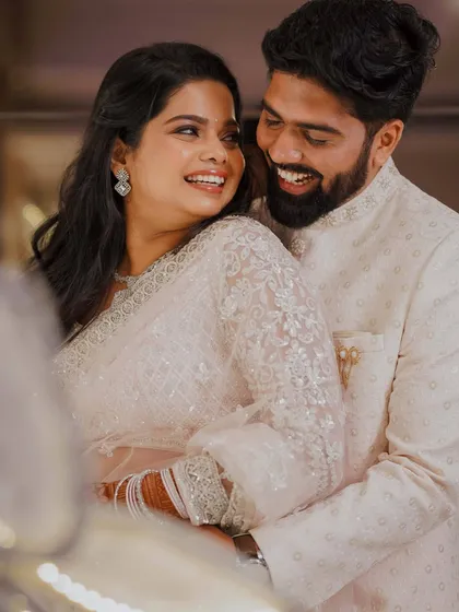 The love and joy are so clear in this photo. Her makeup is soft and romantic, perfect for this intimate moment during their engagement celebration.