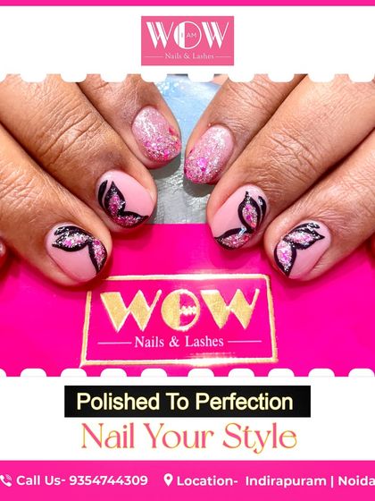 A beautiful and delicate design featuring a soft pink base with sparkling glitter and hand-painted black butterfly wings.